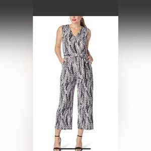 Iman Global Chic cropped jumpsuit with self belt. Size large, petite.